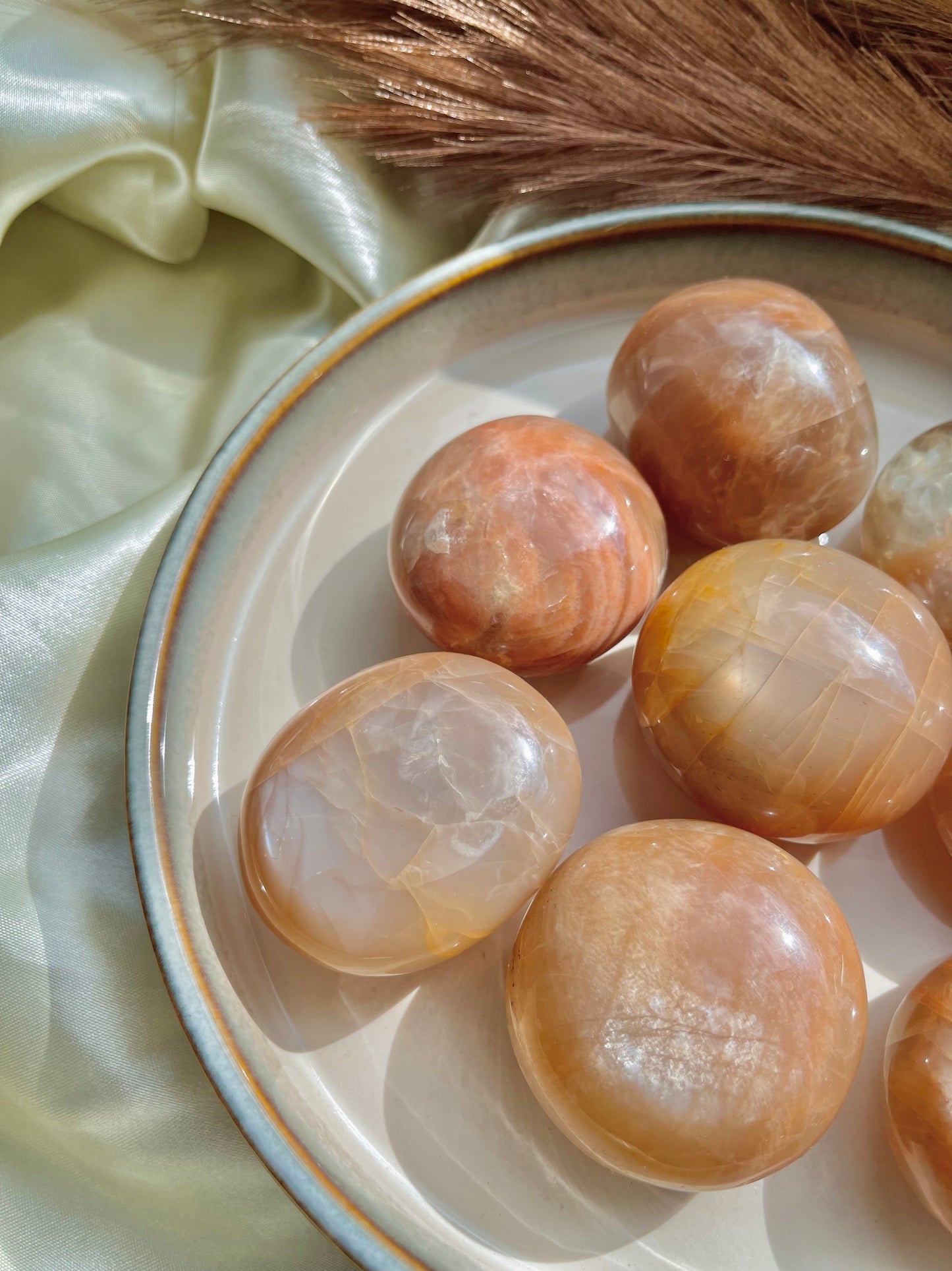 Peach moonstone palm stone