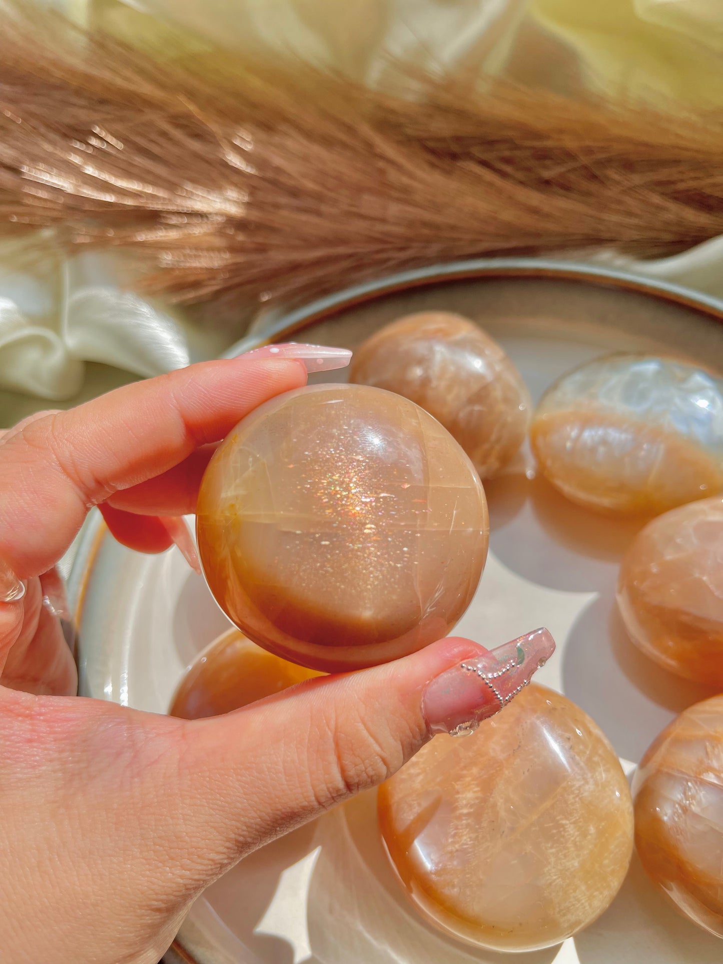 Peach moonstone palm stone