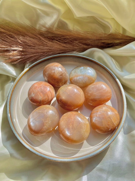 Peach moonstone palm stone