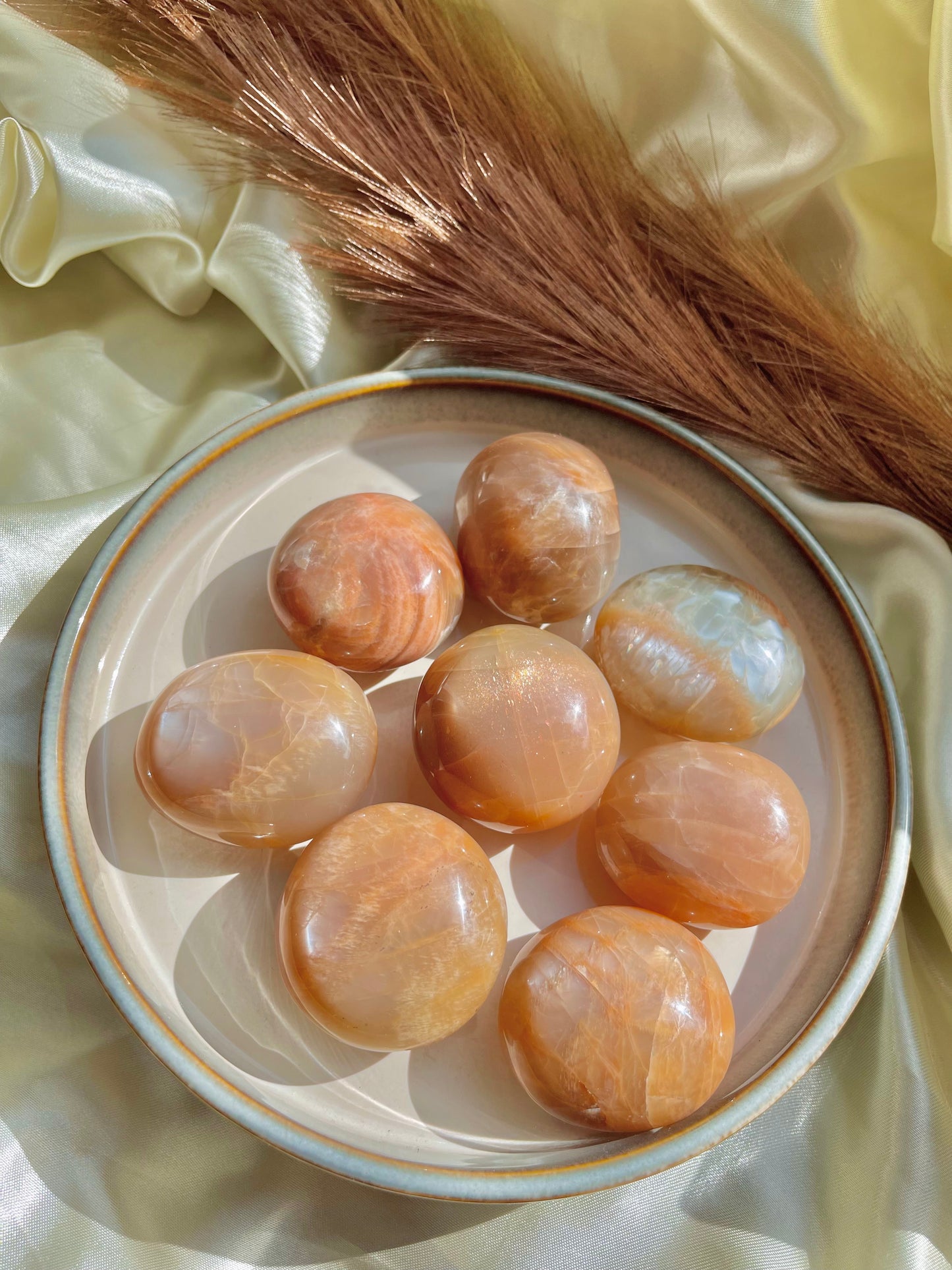 Peach moonstone palm stone